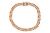 A 9ct gold fancy-link bracelet, comprising a series of interwoven oval links, completed with an integral box clasp and two additional safety catches, 19.5cm in length, 0.8cm in width, 10.5 grams.