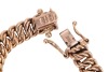 A 9ct gold fancy-link bracelet, comprising a series of interwoven oval links, completed with an integral box clasp and two additional safety catches, 19.5cm in length, 0.8cm in width, 10.5 grams. - 2