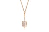 A spinner pendant on chain, featuring a stylised spinning top pendant engraved with levels of affection such as 'with all his heart' and 'he loves me not', surface testing as 18ct, the pendant to a yellow metal rope link chain surface testing as 9ct, meas