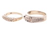 Two diamond-set rings; The first a ring grain-set with seven single-cut diamonds, in white metal (may require re-rhodium plating), with chevron border detail, to a plain tapering ring shank marked &lsquo;750&rsquo;, size L, 2.5 grams; The second a ring grain-set with - 3