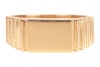 A signet ring in 18ct yellow gold, with a polished vacant rectangular head, between fluted shoulders leading to a flat shank, British import marks, size U, 6.7 grams. - 2
