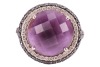 An amethyst and diamond dress ring, featuring a central claw-set round mixed-cut amethyst of vivid purple colour, measuring 13.4mm in diameter, encircled by a curved border grain-set with a single row of round brilliant-cut diamonds and an additional thre - 2