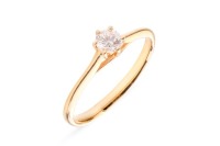 A diamond solitaire ring, composed of a round brilliant-cut diamond, with an estimated carat weight of 0.20ct, in a six-prong setting, with tapered shoulders leading to a D-profile shank, in unmarked yellow metal surface tested as 18ct, size N1/2; 1.9 gra