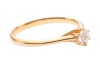 A diamond solitaire ring, composed of a round brilliant-cut diamond, with an estimated carat weight of 0.20ct, in a six-prong setting, with tapered shoulders leading to a D-profile shank, in unmarked yellow metal surface tested as 18ct, size N1/2; 1.9 gra - 3