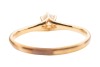 A diamond solitaire ring, composed of a round brilliant-cut diamond, with an estimated carat weight of 0.20ct, in a six-prong setting, with tapered shoulders leading to a D-profile shank, in unmarked yellow metal surface tested as 18ct, size N1/2; 1.9 gra - 4