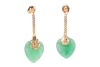 A pair of jade heart drop earrings, each consisting of a carved heart-shaped jadeite, on a flowerhead surmount, chain suspended from an ear post and butterfly fitting, unmarked yellow metal surface testing as 18ct, overall drop length 3.0 cm, 3.2 grams. P - 2