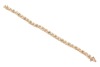 An emerald line bracelet, comprising fourteen round-cut emeralds, interspersed by stylised cross forms and a white-metal illusion panel, every other white metal panel illusion-set with a rose-cut diamond, measuring 18.0cm in length, completed with an inte - 3