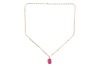 A large synthetic ruby pendant on chain, featuring a large oval-cut synthetic ruby of 18.0 x 13.5 x 8.5 mm, in a claw setting with tapered bail, yellow metal testing as 9ct, on a 60.0 cm long flat anchor link chain with lobster clasp, pink metal stamped ' - 3