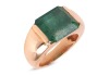 An emerald dress ring, featuring a deep green coloured emerald with sub-translucent transparency, approximately measuring 11.1 x 12.1 mm, bar set on a yellow metal mount surface tested as 18ct, with trumpeted shoulders to a court profile shank, unmarked, 