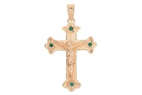 A gem-set crucifix pendant in 18ct yellow gold, the arms decorated with star-set circular-cut emeralds, on a reeded bail, British assay marks, 7.0cm drop, 14.8 grams.
