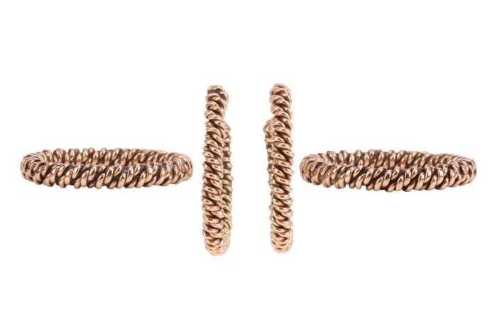 A pair of hoop earrings and matching rings; the hoop earrings of twisted chain design, with ear post and butterfly fittings, unmarked yellow metal surface testing as 9ct, 2.7 cm drop; together with two matching rings of conforming design, size P; total we