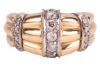 A diamond-set dress ring, of tapered and fluted design, with three decorative bands of round brilliant-cut diamonds, estimated total weight 0.20ct, in two-toned metal stamped '18ct', size N, 6.51 grams. - 2