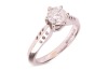 A diamond solitaire ring, comprising a central round brilliant-cut diamond in a six claw setting, with an estimated carat weight of 0.83ct, to tapering shoulders with circular drilled detail, to an 18ct white gold knife-edge band, size N, 4.9 grams.