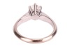 A diamond solitaire ring, comprising a central round brilliant-cut diamond in a six claw setting, with an estimated carat weight of 0.83ct, to tapering shoulders with circular drilled detail, to an 18ct white gold knife-edge band, size N, 4.9 grams. - 4