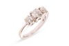 A diamond trilogy ring, with an estimated total diamond weight of 1.00ct, comprising three graduated round brilliant-cut diamonds in claw setting, between tapered shoulders leading to a flat shank, white metal stamped '750', size J, 4.3 grams. Approximate