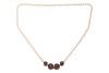 A long cultured pearl necklace with a Modernist centrepiece, comprising four cylinders each set with a diamond accent on both sides, attached to a hand-knotted strand of round cultured pearls, measuring 6.2 mm in diameter, metal testing as silver and 18ct