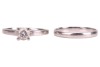 A diamond solitaire ring and a band ring, the solitaire featuring a claw-set round brilliant-cut diamond of estimated 0.83ct, to a plain platinum ring shank, size T, 5.24 grams, together with a plain platinum band ring, size T &frac12;, 3.6 grams. Together with 