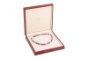 A South Sea Tahitian cultured pearl necklace, comprising a single row of graduated Tahitian cultured pearls of various shades, the pearls graduating between 8.3mm and 11.0mm, completed with a ball clasp marked &lsquo;750&rsquo;, approximately 41.5cm in length, 49.0 g - 2