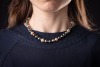A South Sea Tahitian cultured pearl necklace, comprising a single row of graduated Tahitian cultured pearls of various shades, the pearls graduating between 8.3mm and 11.0mm, completed with a ball clasp marked &lsquo;750&rsquo;, approximately 41.5cm in length, 49.0 g - 4