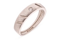 A diamond-set band, featuring a gypsy-set round brilliant diamond with an estimated carat weight of 0.05ct, to a white metal band with ridged design, marked &lsquo;P950&rsquo;, size P1/2; 6.0 grams