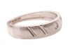 A diamond-set band, featuring a gypsy-set round brilliant diamond with an estimated carat weight of 0.05ct, to a white metal band with ridged design, marked &lsquo;P950&rsquo;, size P1/2; 6.0 grams - 3