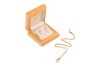 A cultured pearl and diamond necklace and a pair of cultured pearl and diamond earrings; the necklace comprising a 8.3mm cream cultured pearl detailed with a diamond-set surmount of foliate design, to a stylized bale and suspended from an 18ct fine curb-l