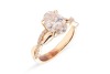 A laboratory-grown diamond solitaire ring, centred with an oval-cut diamond of 1.51ct, between twisted diamond-set shoulders leading to shank, in unmarked yellow metal surface testing as 14ct, size K, 4.3 grams. Diamond has been inscribed with an IGI repo