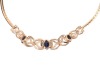A sapphire and diamond-set necklace, set with three claw-set oval sapphires and four round brilliant diamonds, in a slightly curved mount featuring &lsquo;X&rsquo;-style links, to a flat snake-link chain to a lobster clasp, in yellow metal marked &lsquo;14K&rsquo;, measuring app - 3