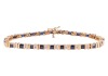 A sapphire and diamond line bracelet, comprising twenty-five square-cut sapphires channel-set in yellow metal, each sapphire interspersed with two channel-set round brilliant-cut diamonds, bracelet measuring approximately 17.5cm in length, completed with 