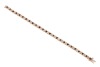 A sapphire and diamond line bracelet, comprising twenty-five square-cut sapphires channel-set in yellow metal, each sapphire interspersed with two channel-set round brilliant-cut diamonds, bracelet measuring approximately 17.5cm in length, completed with - 2