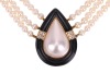 A Mab&eacute; pearl and onyx necklace, comprising three rows of cultured pearls and round onyx beads, bar spacers set with rows of diamond accents, the teardrop-shaped centre piece functioning as a box clasp, centred with a mab&eacute; pearl within a conforming hardsto - 2