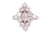 A diamond cluster ring, with an estimated total diamond weight of 2.00ct, the rhombic cluster is composed of a marquise-cut diamond and twelve round brilliant-cut diamonds, set in a wire basket and tapered shoulders, in white metal surface testing as 18ct - 2