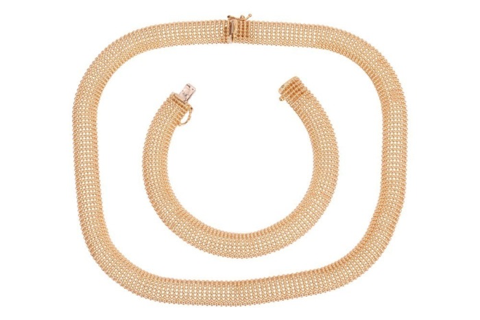 An 18ct yellow gold ball link mesh necklace and bracelet set; comprising highly flexible mesh of ball links, with concealed tongue clasp fastenings, Italian and British assay marks; necklace measures 34.0 cm laying flat (can be extended to 42.5 cm), match