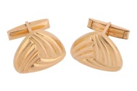 A pair of triangular cufflinks of reeded design, fitted with swivel backs, yellow metal marked '750', cufflink motif measures 2.4 cm across, total weight of item 46.7 grams.