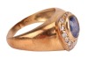 A sapphire and diamond dress ring, the egg-shaped ring head collet-set with an oval-cut sapphire of 7.0 x 5.5 x 4.2 mm, in surround bead-set with round brilliant-cut diamonds, leading to tapering shank in yellow metal marked '750', ring head 1.5 x 1.1 cm, - 3