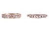 Two rings; comprising a diamond-set seven-stone ring, in a white metal mount marked &lsquo;750&rsquo;, size N, together with a diamond-set dress ring, grain-set with round brilliant diamonds in a 9ct yellow gold mount, size L; 4.8 grams (2)