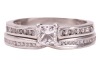 A single stone diamond ring, the princess-cut diamond claw-mounted in platinum above channel-set diamond shoulders, accompanied by a GIA report stating that the diamond is E, VS1 and 0.41 carats; together with a platinum and diamond set crossover wedding 