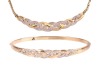 A diamond-set hinged bangle, of interlocking woven design, partly set with round brilliant diamonds, with integrated push bar clasp, marked &lsquo;375&rsquo;, together with a matching necklace, the curved bar of similar design, and leading to a flat link chain, with 
