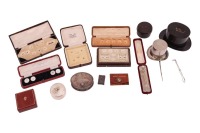 A collection of gentlemen's accessories and stick pins, including a cased fox and hunting motif stick pin (tests as 14 carat gold), a single stone pearl stick pin in the form of a floral sprig, a sterling silver riding crop hunting pin, several unusual st