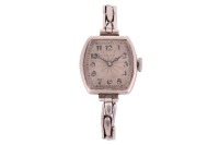 Rolex &ndash; An Art Deco Silver Wristwatch Reference: 54810 Serial: 16 Year: Glasgow Import Marks for 1926 Bezel: Smooth, Tonneau-Form Case Material: Silver Case Diameter: Approximately 20mm x 20mm Dial: Silvered, Scalloped Texture Numerals: Black Arabic Numer