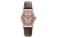 Dunhill - An Octagonal Wristwatch Reference: 114 Serial: 10114 Bezel: Smooth Case Material: Stainless Steel Case Diameter: Approximately 27mm x 32mm Dial: Silvered, Blued Breguet Hands Numerals: Black Arabic, Minute Track Crown: Fluted Movement: Dunhill (
