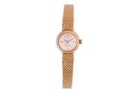 Omega &ndash; An &lsquo;18K&rsquo; Dress Watch Reference: 7154 Serial: 671908 Bezel: Smooth, Faceted Crystal Case Material: &lsquo;18K&rsquo; Case Diameter: Approximately 14mm Dial: Silvered, Sunburst, Pointed Baton Hands Numerals: Baton Crown: Signed, Fluted Movement: Omega Calibre 6