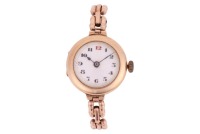 A 9ct Gold Dress Watch Reference: 66340 Year: Hallmarked London 1860 Bezel: Smooth Case Material: 9ct Yellow Gold (Inside of Case Back marked City Watch Case Co Ltd) Case Diameter: Approximately 24mm Dial: White Enamel Numerals: Black Arabic Numerals, Red