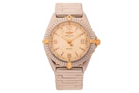 Breitling - A Wings Automatic Wristwatch Reference: B10050 Serial: 6119 Bezel: Uni-Directional Year: Purchased 2000 Case Material: Stainless Steel Case Diameter: Approximately 37mm Dial: Cream, Central Hobnail Texture Numerals: Baton, Arabic at twelve, si
