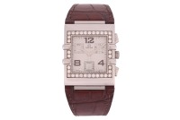 Omega - A Constellation Quadra Wristwatch Reference: 885.1201 Serial: 58255326 Bezel: Diamond-Set Year: circa 2000 Case Material: Stainless Steel Case Diameter: Approximately 30mm x 34mm Dial: Cream Enamel Numerals: Arabic at twelve, four and eight o&rsquo;cloc