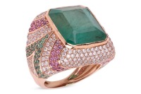 An emerald, pink sapphire and diamond cocktail ring, comprising a central collet-set step-cut emerald, of yellowish-green hue and estimated at 17.70ct, the cushion-shaped ring grain-set with round brilliant-cut diamonds, round-cut pink sapphires and round
