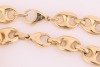 A heavy anchor link necklace and a matching bracelet; fastened with lobster clasp, marked '750', link width 8.8 mm, measuring 51.0 cm and 21.0 cm in length respectively, total weight of item 107.69 grams. (2) - 2