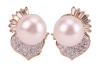A pair of cultured pearl and diamond-set earrings, the cultured pearls measuring approximately 9.5mm, each flanked by a stylised leaf design panel, pav&eacute;-set with diamonds, accented by tapered baguette-cut diamonds, in a yellow metal mount with post fittin