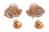 A pair of cultured pearl and diamond-set earrings, the cultured pearls measuring approximately 9.5mm, each flanked by a stylised leaf design panel, pav&eacute;-set with diamonds, accented by tapered baguette-cut diamonds, in a yellow metal mount with post fittin - 2