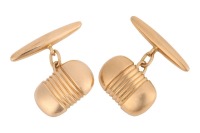 A pair of oblong cufflinks, with reeded details at the centre, fitted with linked torpedo backs, yellow metal marked '18ct', total weight of items 9.61 grams.